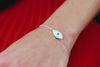 0.22 Carat Total Round Cut Diamond Mother of Pearl Evil Eye Bracelet in White Gold