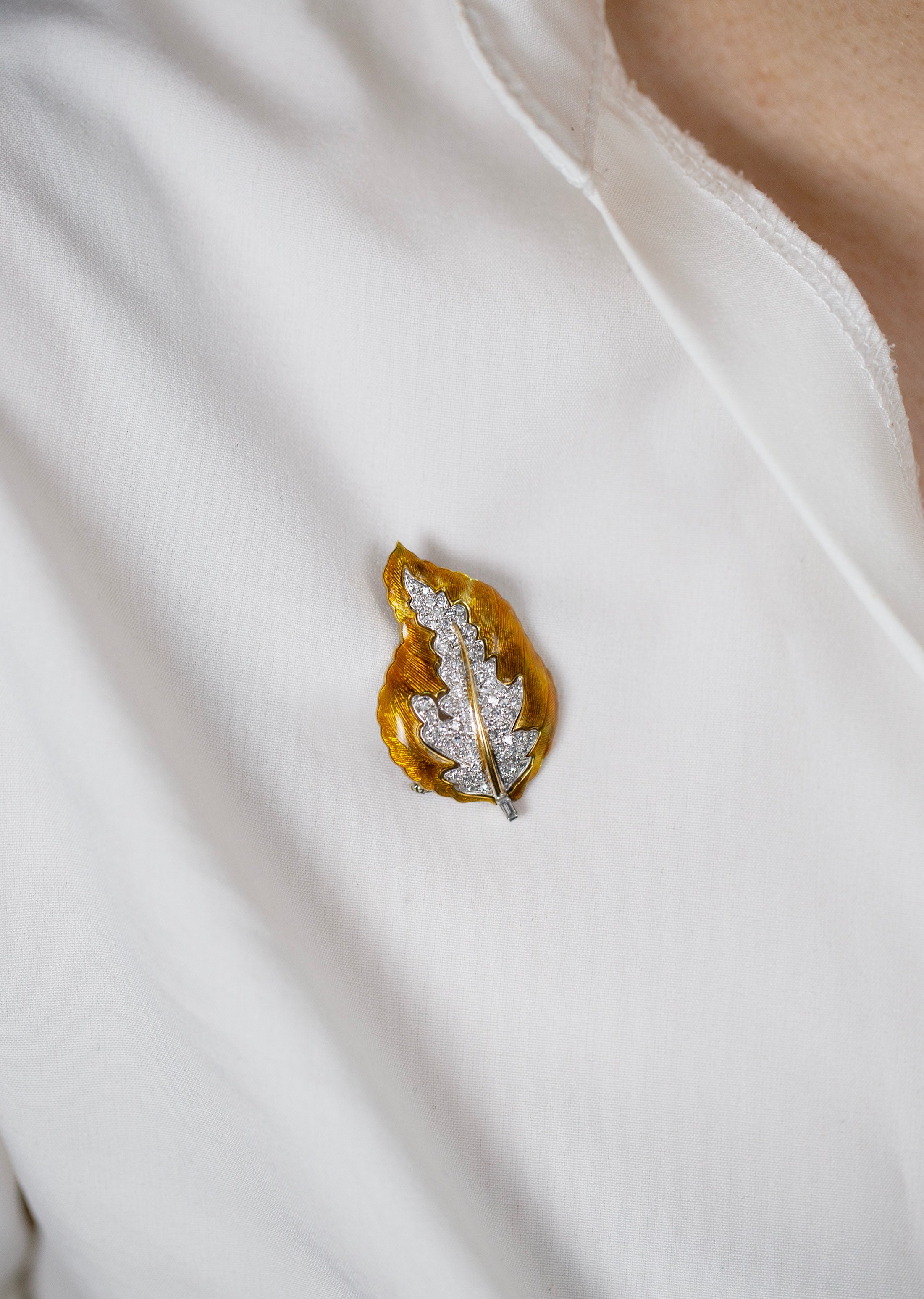 0.85 Carats Total Round Diamond, Yellowish and Orange Enamel Leaf Design Brooch in Yellow Gold and Platinum