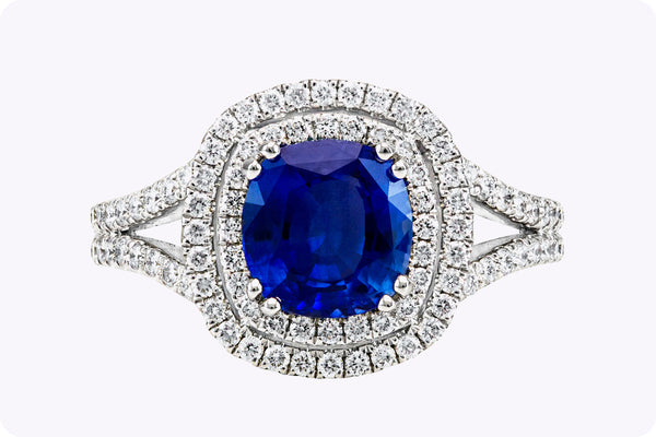 2.06 Carats Cushion Cut Blue Sapphire and Diamond Halo Engagement Ring in White Gold