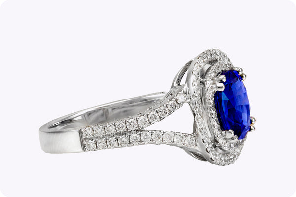 2.06 Carats Cushion Cut Blue Sapphire and Diamond Halo Engagement Ring in White Gold