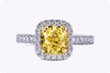 GIA Certified 2.01 Carats Fancy Light Yellow Diamond Halo Engagement Ring in Yellow Gold & Platinum