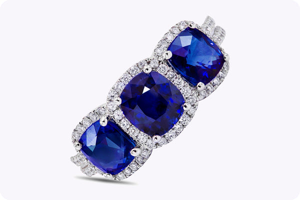 3.25 Carats Cushion Cut Blue Sapphire & Diamond Three-Stone Halo Engagement Ring in White Gold