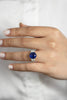 6.15 Carats Cushion Cut Blue Sapphire and Diamond Three-Stone Engagement Ring in Platinum