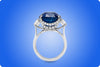 15.68 Carat Cushion Cut Ceylon Intense Blue Sapphire Three-Stone Engagement Ring in Platinum