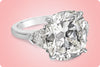 GIA Certified 10.26 Carat Cushion Cut Diamond Three-Stone Engagement Ring in Platinum