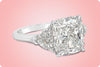 GIA Certified 6.20 Carat Cushion Cut Diamond Three-Stone Engagement Ring in Platinum