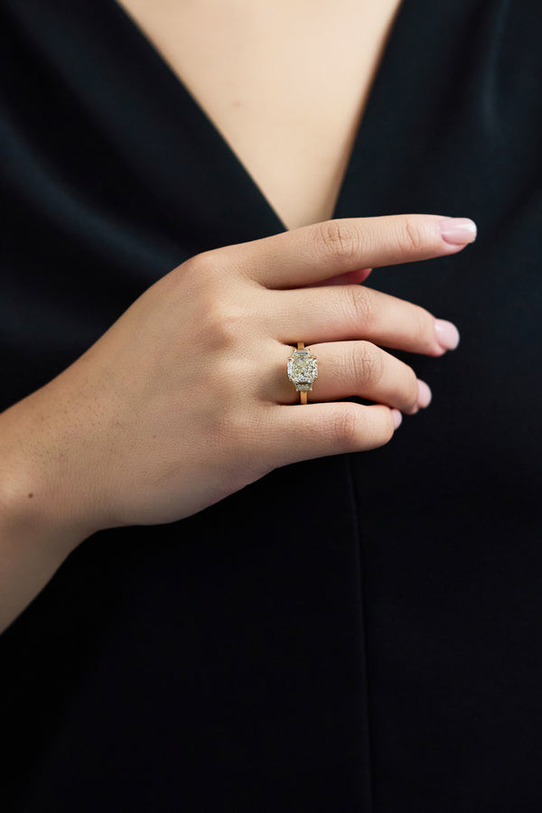 Timeless 3.51-carat cushion cut diamond three-stone engagement ring