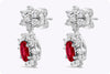 3.44 Carats Total Oval Cut Ruby and Round Diamond Dangle Earrings in White Gold