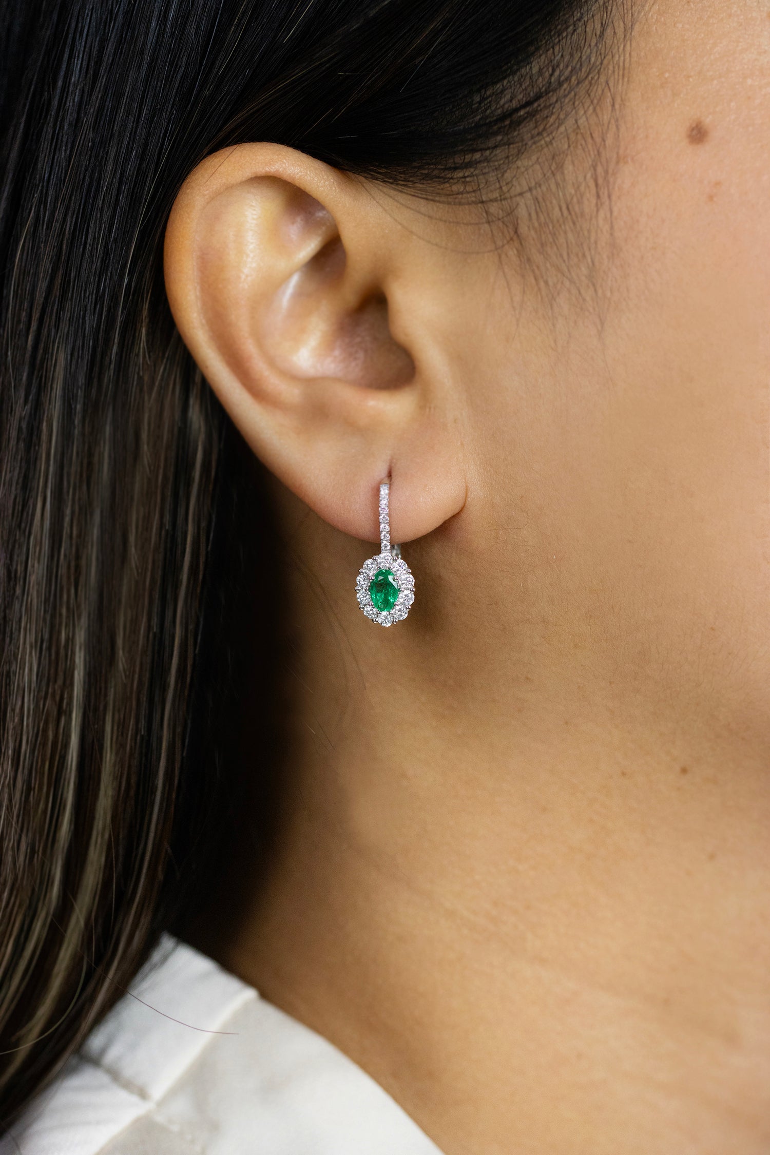 0.78 Carat Oval Cut Emerald and Diamond Halo Lever-Back Earrings