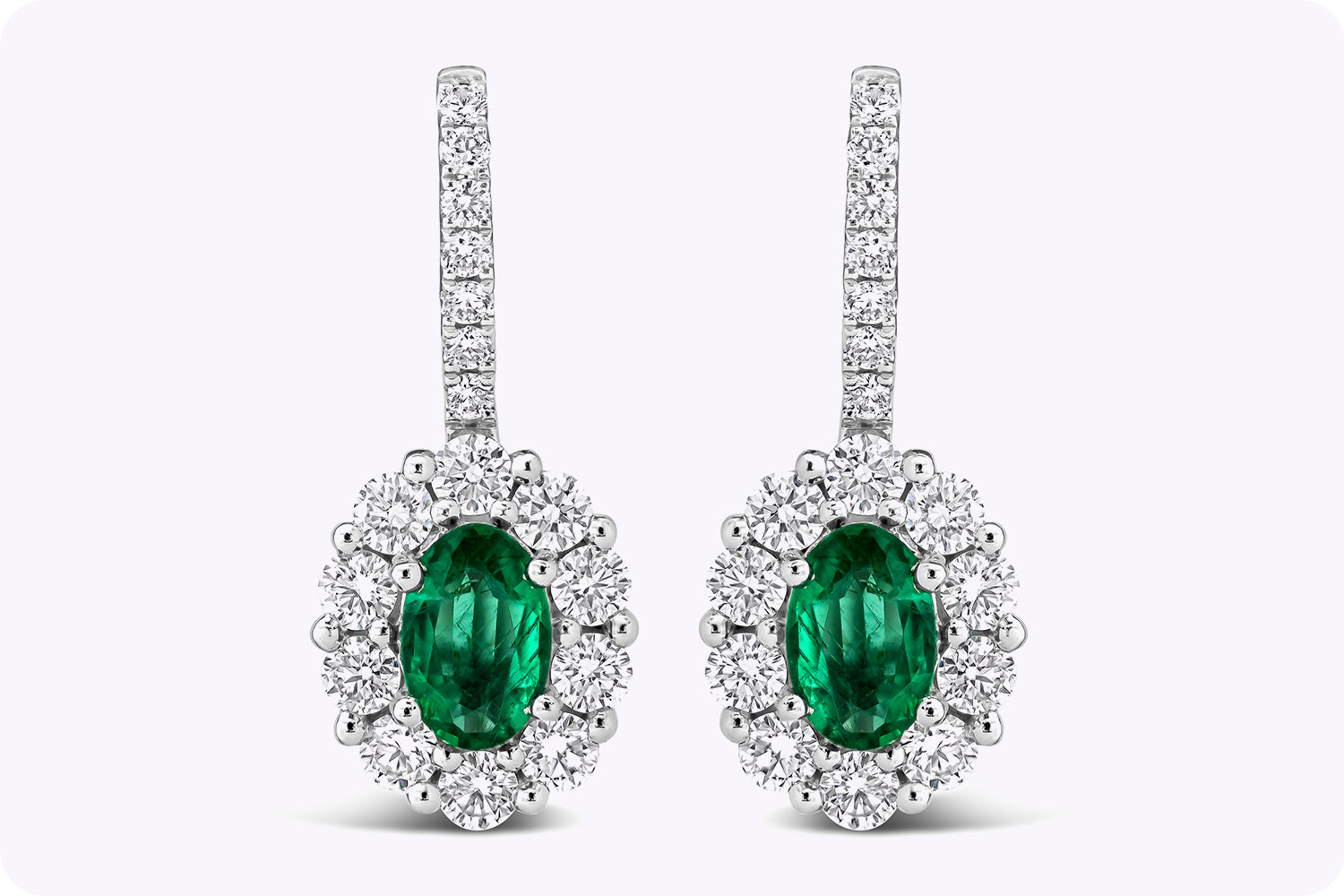 0.78 Carat Oval Cut Emerald and Diamond Halo Lever-Back Earrings