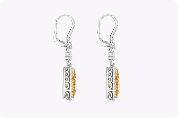 GIA Certified 4.19 Carats Total Pear Shape Yellow Diamond Double Halo Dangle Earrings in Yellow Gold & Platinum