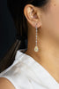 3.20 Carat Pear Shape Diamond Halo Dangle Earrings in White Gold