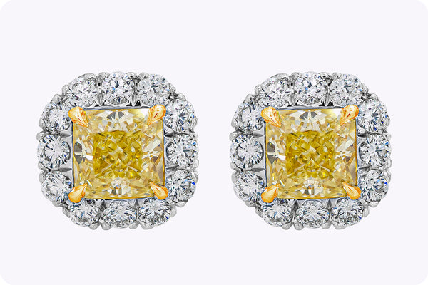 GIA Certified 1.45 Carats Total Radiant Cut Fancy Yellow Diamond Halo Stud Earrings in White Gold and Yellow Gold