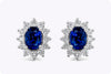 1.53 Carats Total Oval Cut Blue Sapphire and Diamonds Halo Stud Earrings in White Gold
