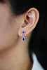 1.40 Carats Pear Shape Blue Sapphires and Diamonds Dangle Earrings in White Gold