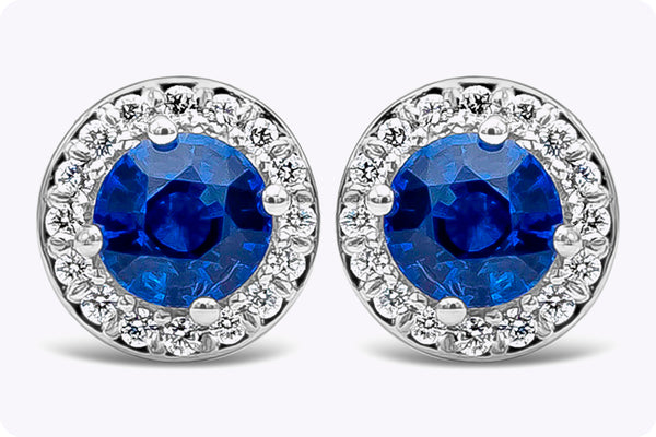 1.28 Carats Blue Sapphire with Diamonds Halo Stud Earrings in White Gold