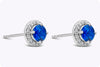 1.28 Carats Blue Sapphire with Diamonds Halo Stud Earrings in White Gold