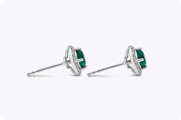 1.20 Carats Total Round Cut Green Emerald and Diamond Halo Stud Earrings in White Gold