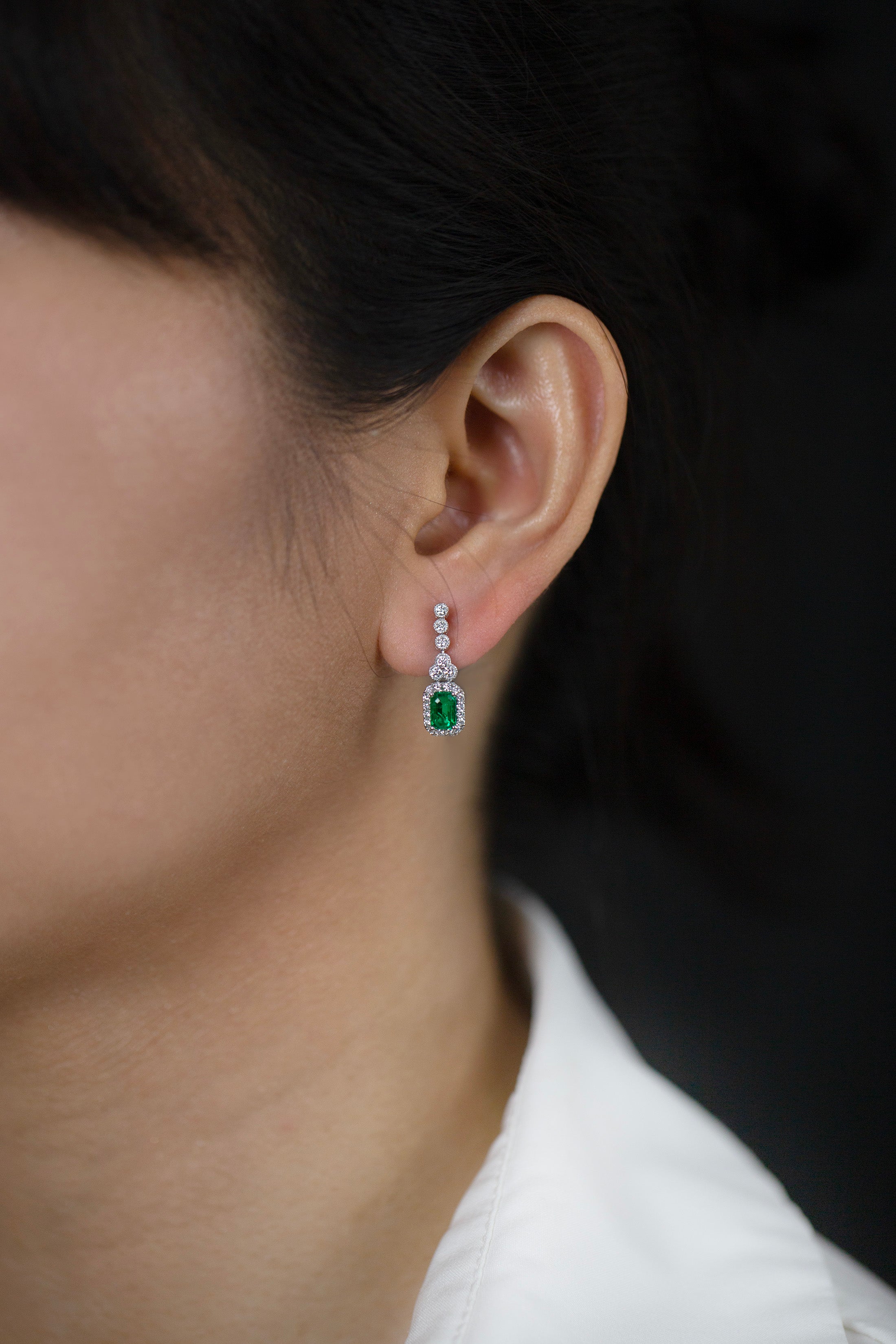 1.02 Carats Total Emerald Cut Emerald with Diamond Halo Dangle Earrings in White Gold