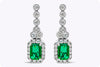1.02 Carats Total Emerald Cut Green Emerald and Round Diamond Halo Dangle Earrings in White Gold