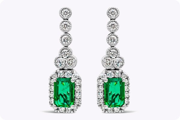 1.02 Carats Total Emerald Cut Emerald with Diamond Halo Dangle Earrings in White Gold