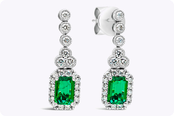 1.02 Carats Total Emerald Cut Emerald with Diamond Halo Dangle Earrings in White Gold