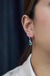 1.95 Carats Oval Cut Emerald & Diamond Halo Dangle Earrings in White Gold