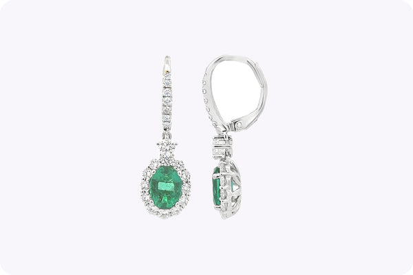 1.95 Carats Oval Cut Emerald & Diamond Halo Dangle Earrings in White Gold