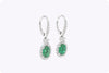 1.95 Carats Oval Cut Emerald & Diamond Halo Dangle Earrings in White Gold