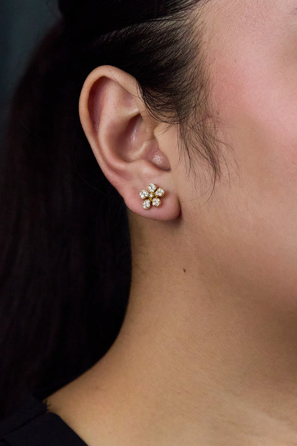 Delicate 0.52 carat round-cut diamond floral stud earrings by Roman Malakov