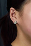 Brilliant 1.02 carat radiant-cut yellow diamond halo earrings by Roman Malakov