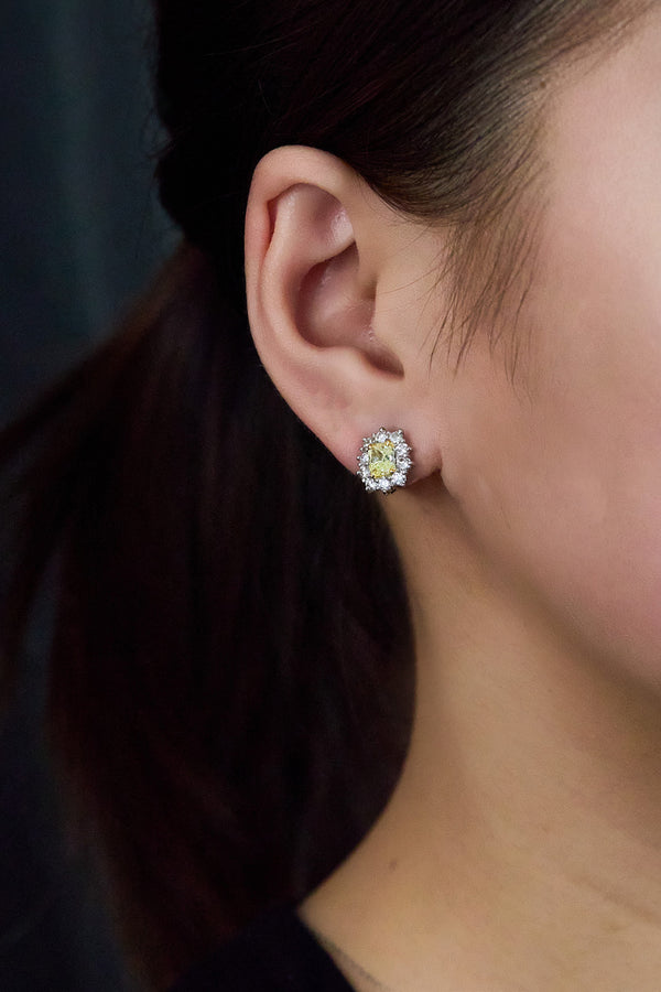 1.02 carat radiant-cut yellow diamond halo earrings by Roman Malakov