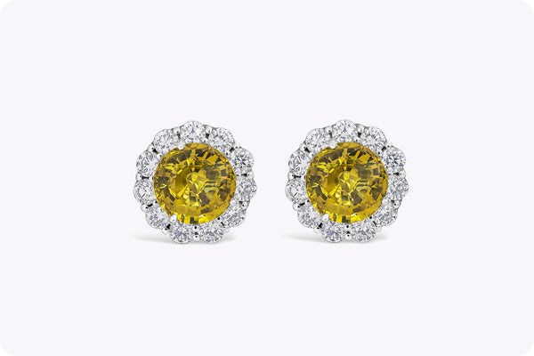 6.94 Carats Total Round Cut Yellow Sapphire and Diamond Halo Stud Earrings in Platinum