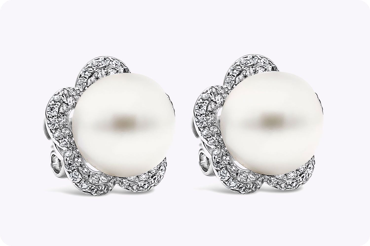 0.73 Carats Total Brilliant Round Diamond and White Pearl Flower Stud Earrings in White Gold