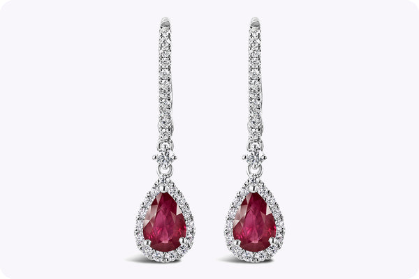 1.49 Carats Pear Shape Ruby and Round Diamond Halo Dangle Earrings in White Gold