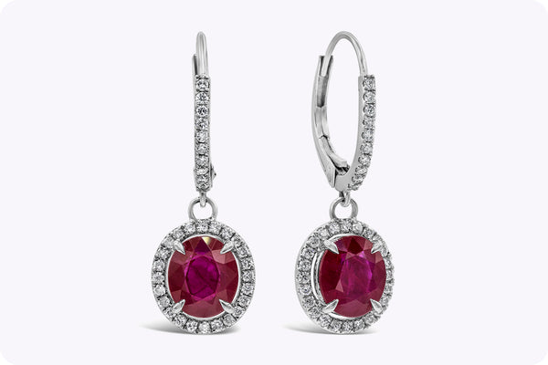 2.83 Carats Total Oval Cut Ruby and Diamond Halo Dangle Earrings in White Gold