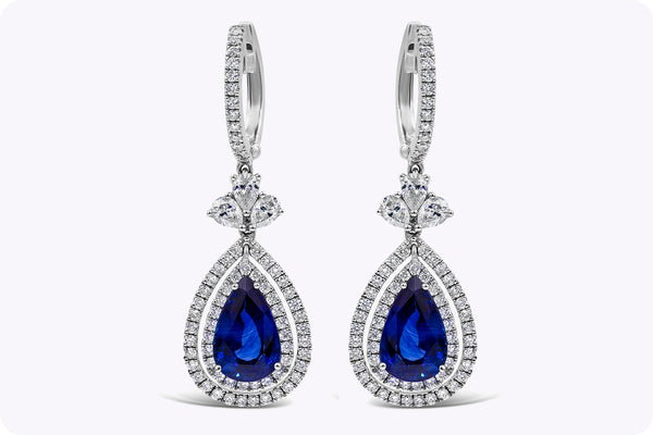 4.18 Carat Blue Sapphire And Diamond Double Halo Dangle Earrings in White Gold