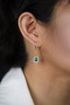 0.69 Carats Total Pear Shape Green Emerald and Yellow Diamond Halo Dangle Earrings in White Gold & Yellow Gold