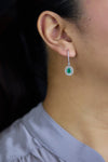 1.01 Carats Total Oval Cut Emerald and Diamond Halo Dangle Earrings in White Gold