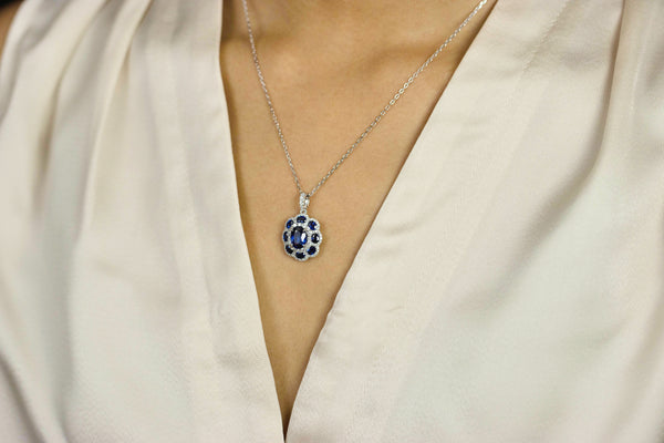 3.88 Carats Total Oval Cut Blue Sapphire Floral Pendant Necklace in White Gold