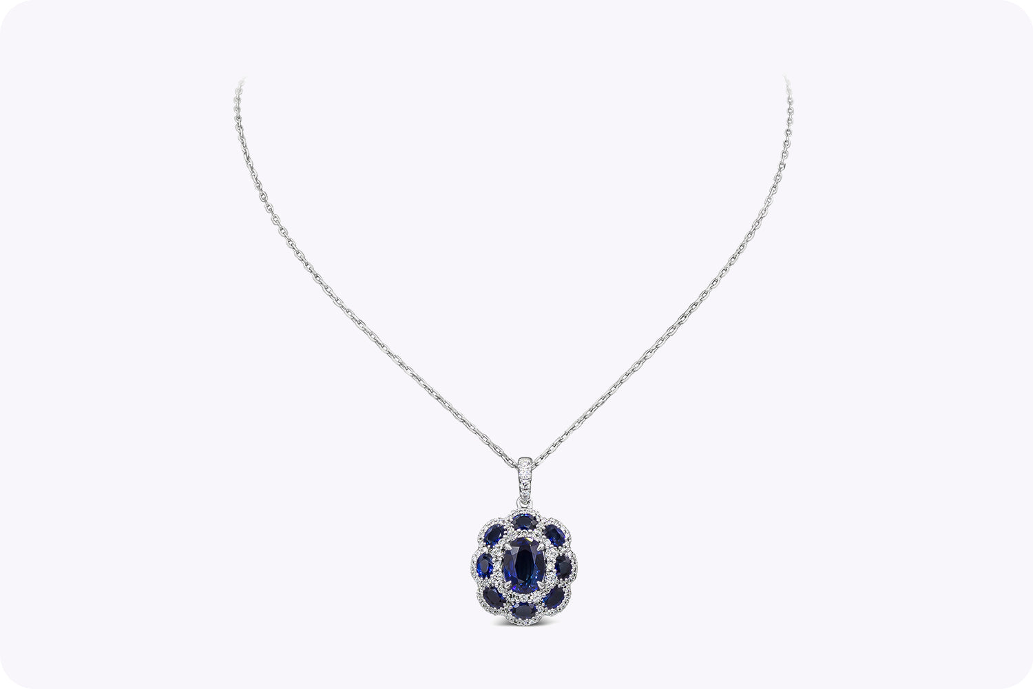 3.88 Carats Total Oval Cut Blue Sapphire Floral Pendant Necklace in White Gold