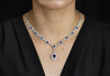6.85 Carats Total Oval Cut Blue Sapphire and Round Diamond Halo Drop Pendant Necklace in White Gold
