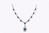 6.85 Carats Total Oval Cut Blue Sapphire and Round Diamond Halo Drop Pendant Necklace in White Gold