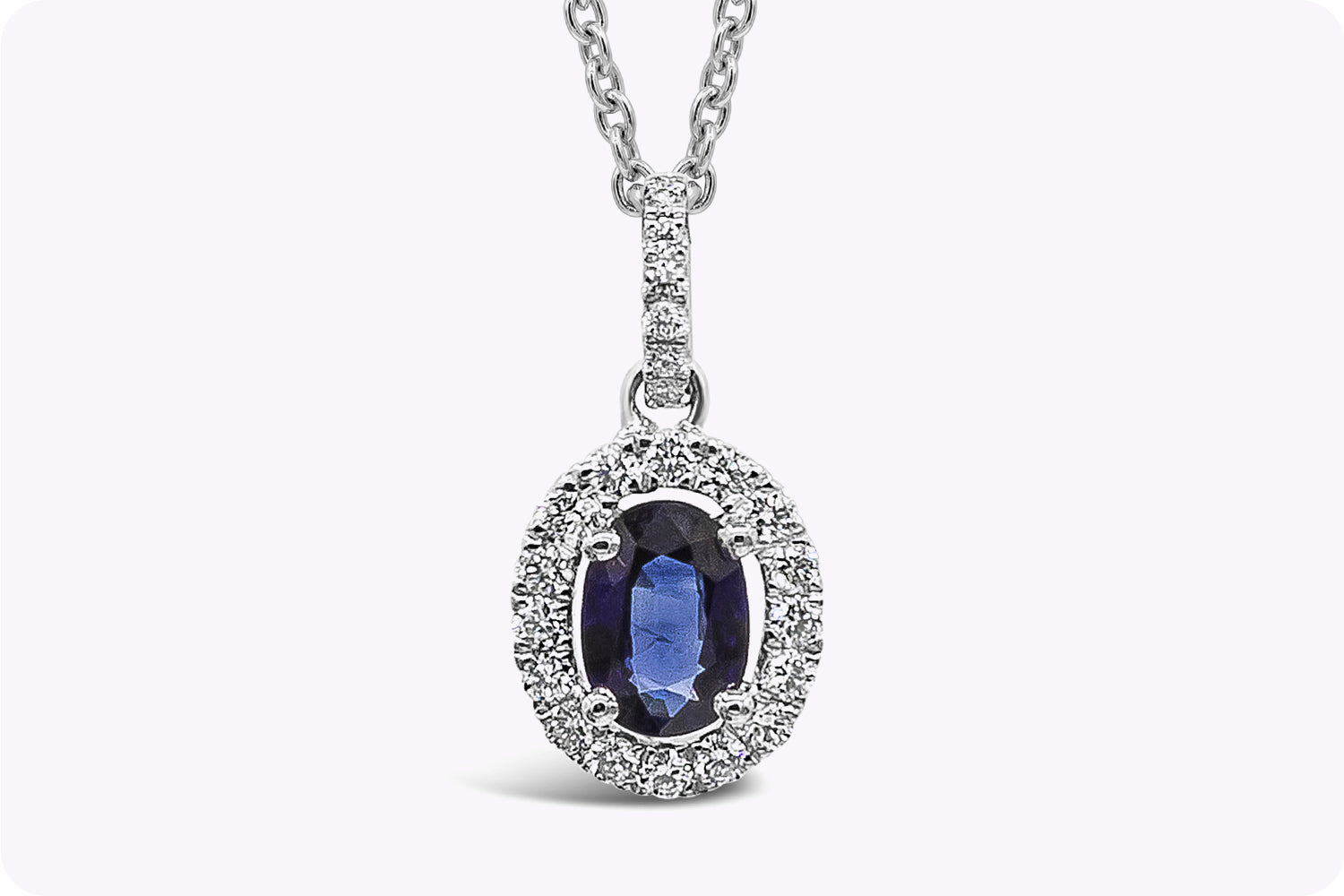 0.96 Carat Total Oval Cut Sapphire & Diamond Halo Pendant Necklace in White Gold