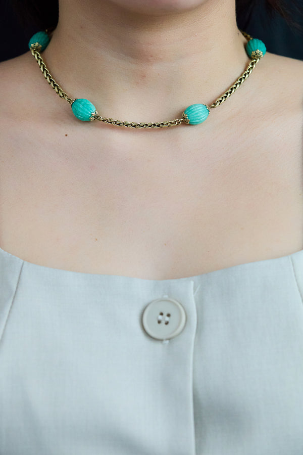 Shop the carved oval turquoise necklace in yellow gold by roman malakov