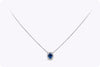 0.73 Carats Oval Cut Blue Sapphire and Diamond Halo Pendant Necklace in White Gold