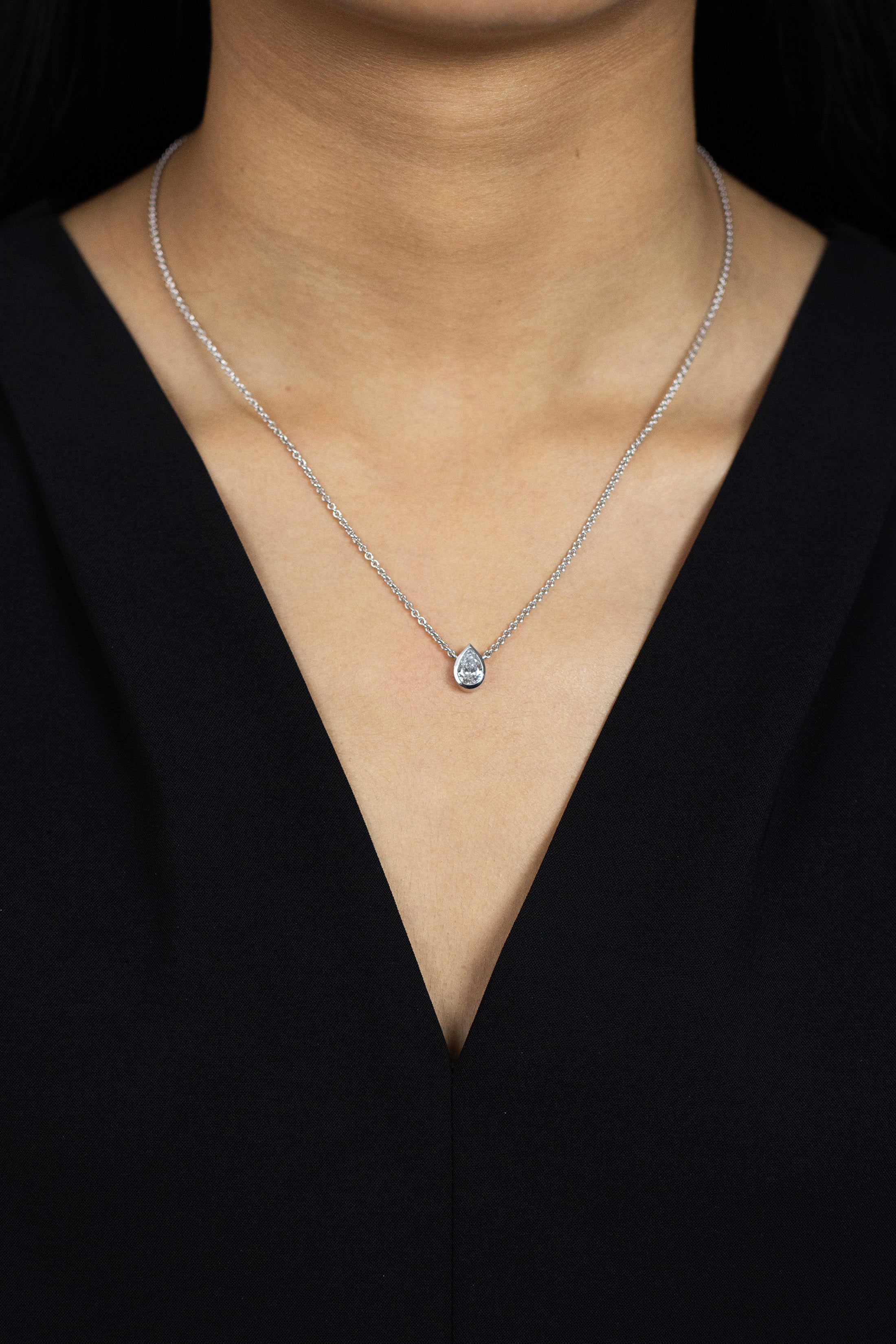 1.02 Carats Pear Shape Diamond Solitaire Bezel Set Pendant Necklace in White Gold