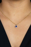 0.73 Carat Sapphire with Diamond Halo Pendant Necklace in White Gold
