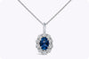 0.38 Carat Oval Cut Sapphire with Diamond Halo Pendant Necklace in White Gold