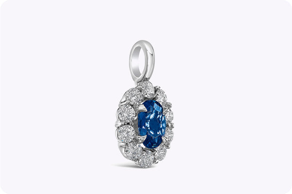 0.73 Carat Total Oval Cut Sapphire & Diamond Halo Pendant Necklace in White Gold